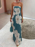 Élodie – Vestido largo palabra de honor azul petróleo con grandes flores blancas y corte fluido