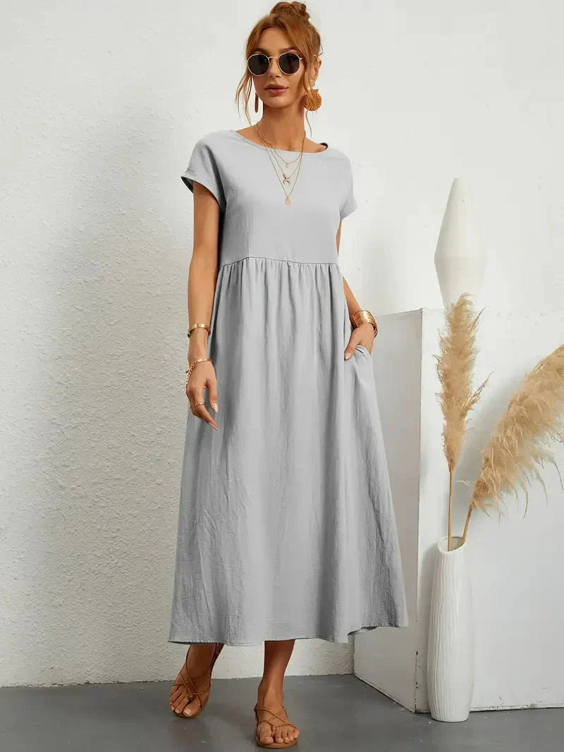 Emily Robe Longue Femme – Robe Maxi Fluide à Manches Courtes avec Poches et Style Décontracté Chic