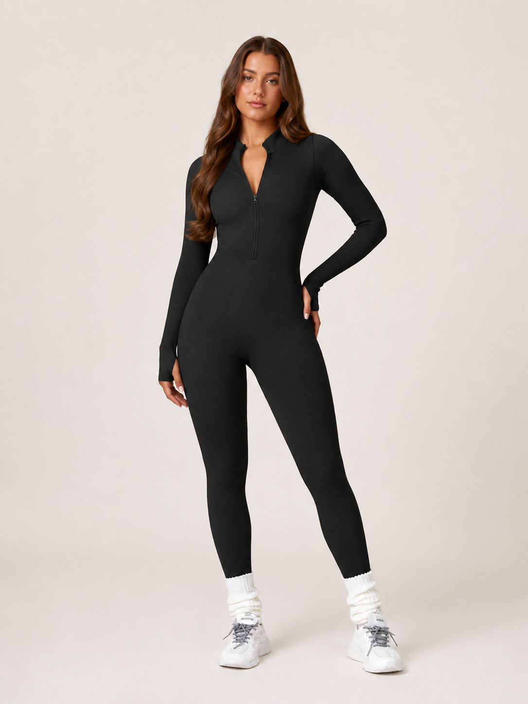 Elowen Naadloze Sport Jumpsuit met Halve Rits, Ribstructuur en Lange Mouwen voor Dames