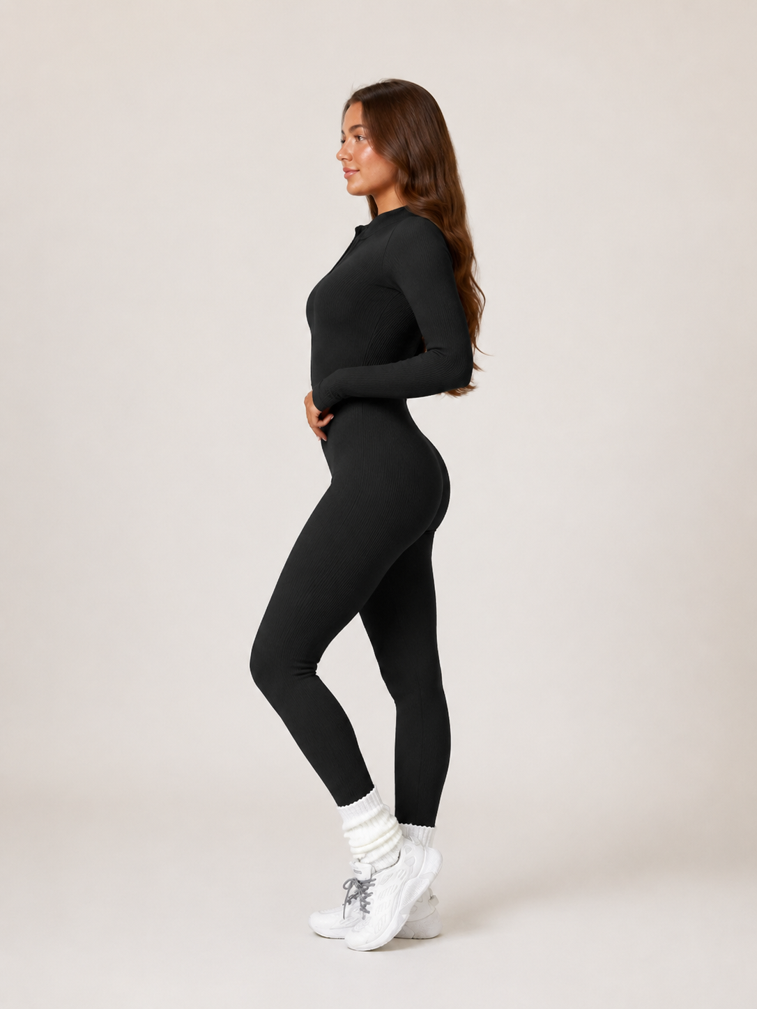 Elowen Naadloze Sport Jumpsuit met Halve Rits, Ribstructuur en Lange Mouwen voor Dames