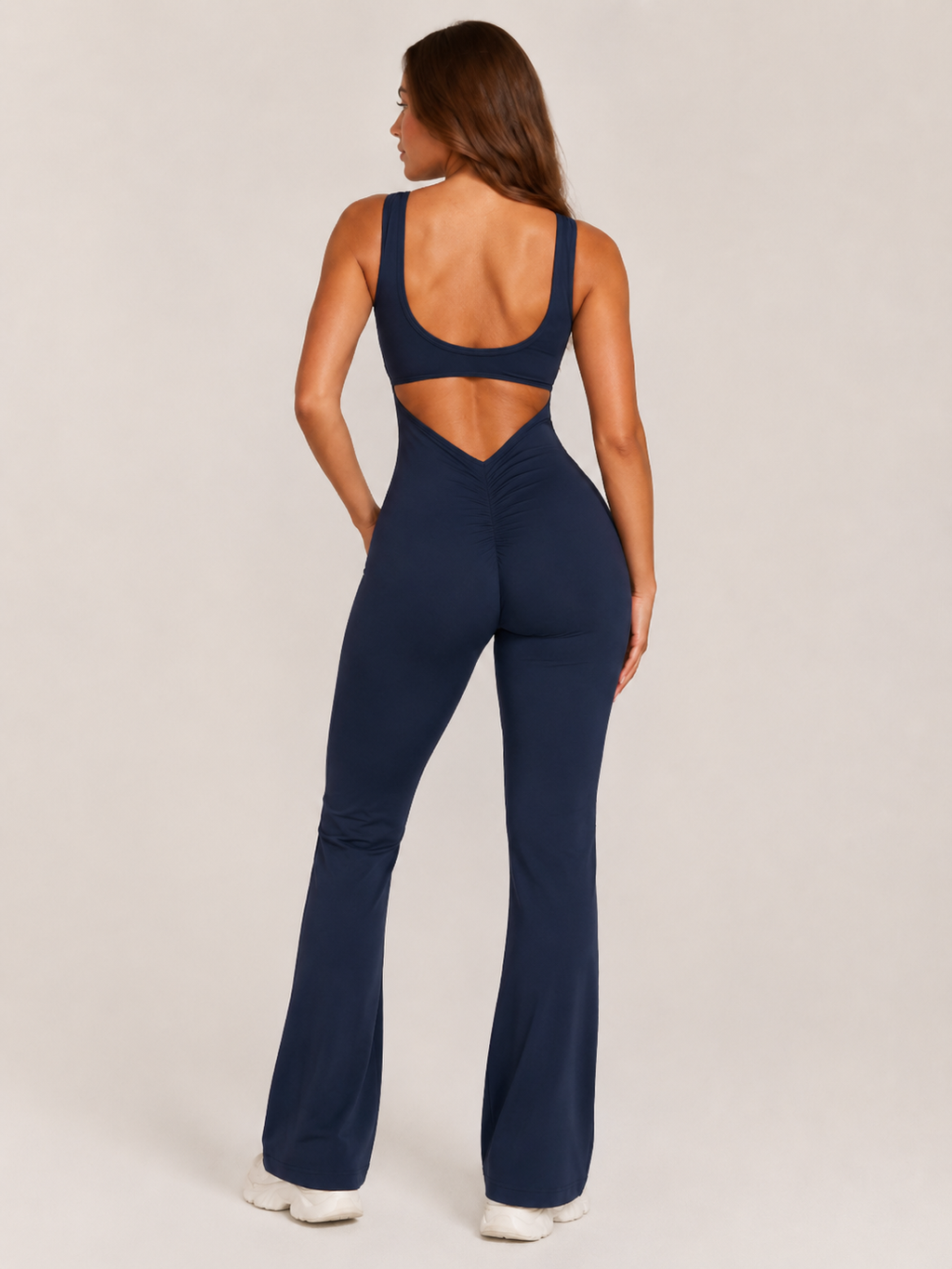 Colette Flared Sport Jumpsuit with Open Back, Fitted Cut, and Stretch Fabric