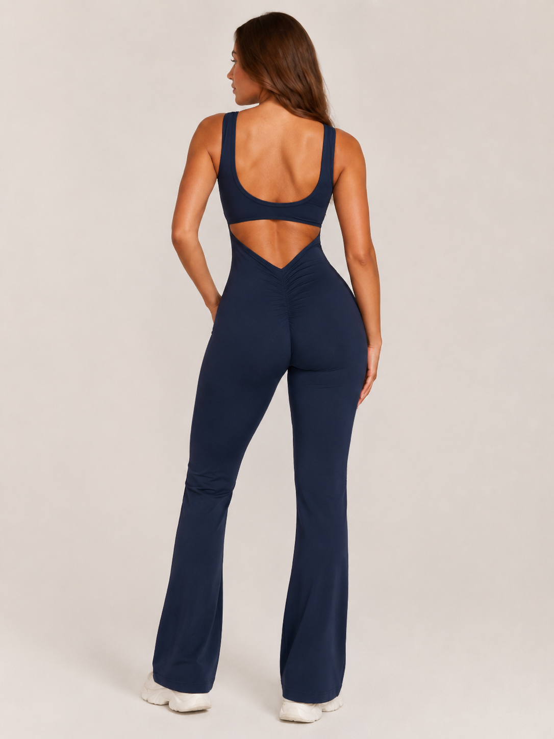 Colette Flared Sport Jumpsuit with Open Back, Fitted Cut, and Stretch Fabric