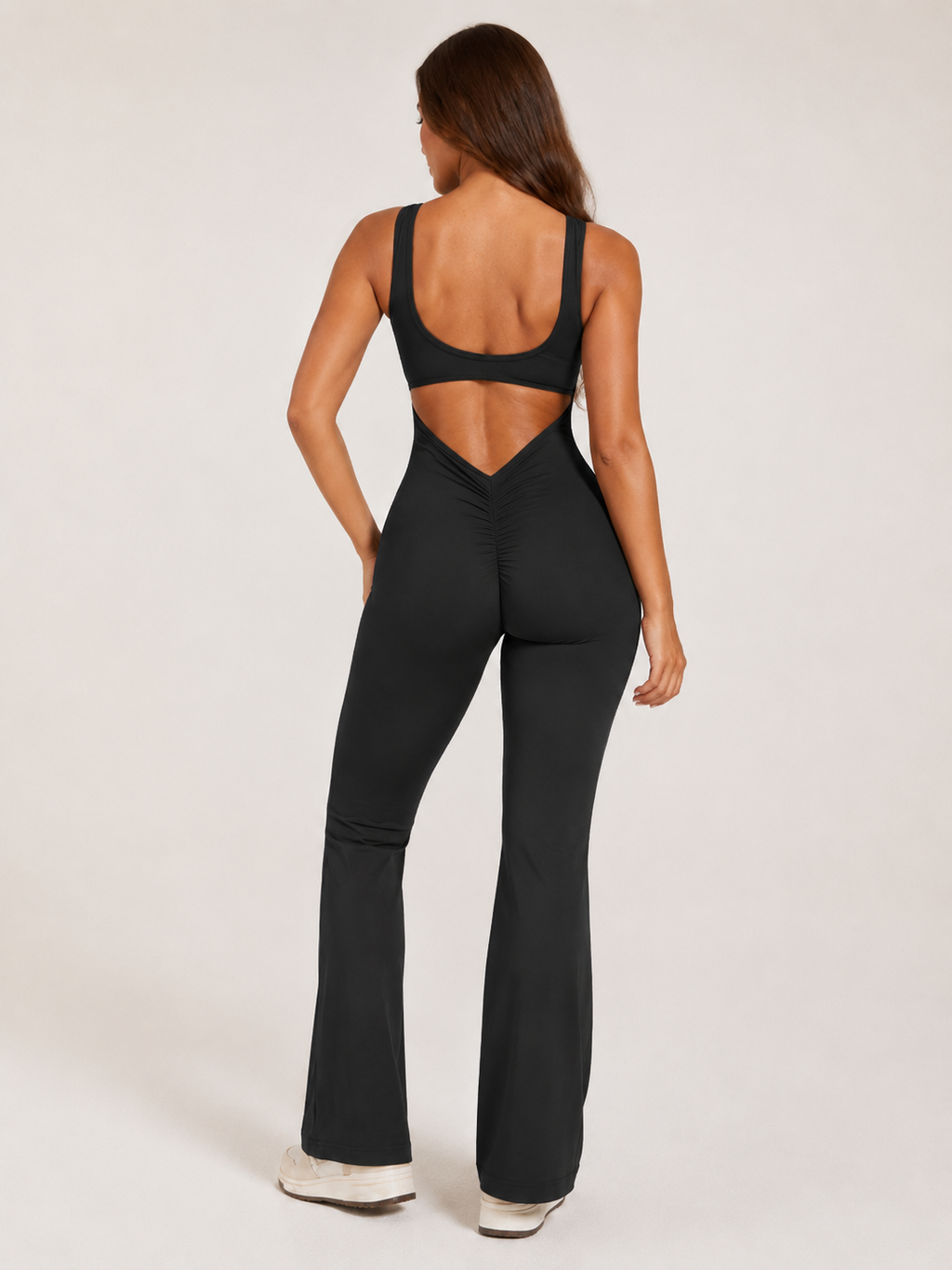 Colette Flared Sport Jumpsuit with Open Back, Fitted Cut, and Stretch Fabric