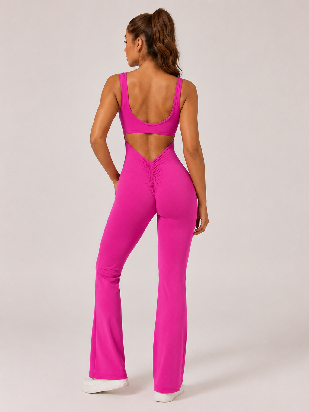 Colette Flared Sport Jumpsuit with Open Back, Fitted Cut, and Stretch Fabric