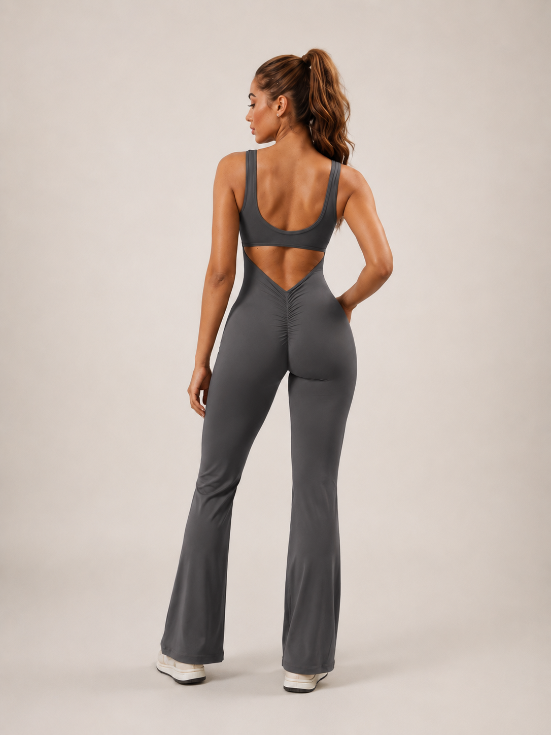 Colette Flared Sport Jumpsuit with Open Back, Fitted Cut, and Stretch Fabric