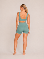 Solène Naadloze Sportset met Crop Top, Hoge Taille Shorts en Ribstructuur voor Dames