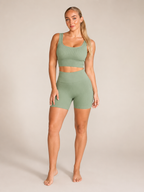Solène Naadloze Sportset met Crop Top, Hoge Taille Shorts en Ribstructuur voor Dames