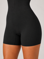 Alizée Combinaison Sport Femme à Manches Courtes Zippée Ajustée en Tissu Stretch Confort