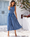 Kiara – Vestido midi de mujer a rayas azules y blancas, sin mangas, con falda fluida y elegante