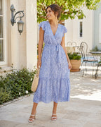 Léonie – Robe midi femme bleue fleurie à col V et manches volantées, coupe fluide