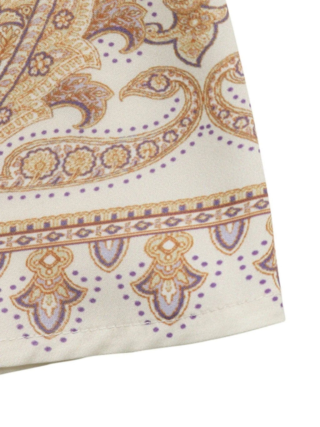 Daphné – Robe courte beige imprimée à manches longues avec ceinture élégante à nouer