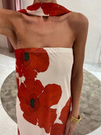 Élodie – Vestido largo palabra de honor azul petróleo con grandes flores blancas y corte fluido