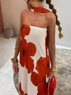 Élodie – Vestido largo palabra de honor azul petróleo con grandes flores blancas y corte fluido