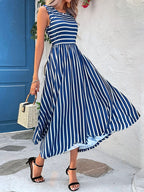 Kiara – Vestido midi de mujer a rayas azules y blancas, sin mangas, con falda fluida y elegante