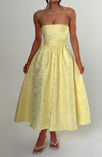 Ursula – Vestido midi de mujer amarillo limón en jacquard floral, con corpiño plisado elegante