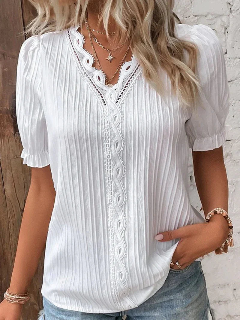 Noémie Blouse à Dentelle Délicate et Col V Élégant aux Manches Bouffantes